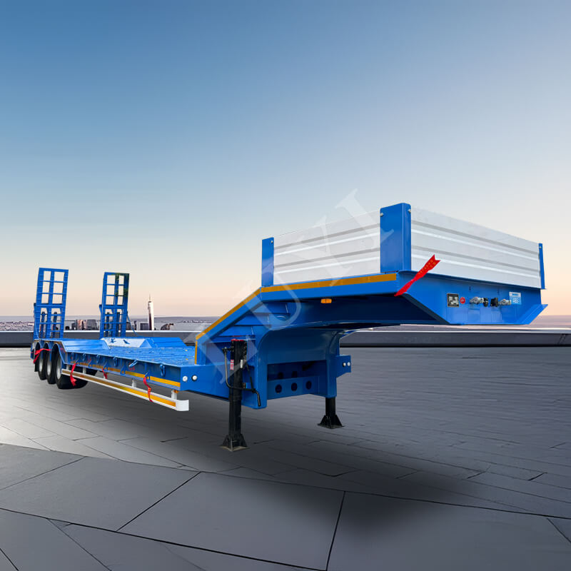 Háromtengelyes mélyágyas félpótkocsi 40-80 tonna teherbírással Háromtengelyes mélyágyas félpótkocsi 40-80 tonna teherbírással